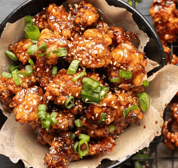 8 Boneless wings, tossed in soy garlic flavor served with a side of coleslaw