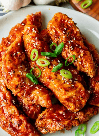 6 Chicken strips, tossed in soy garlic flavor served with a side of coleslaw